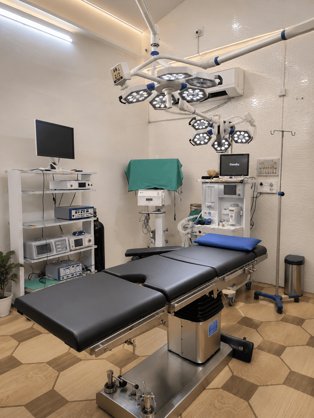 Operation theatre at Dubey Nursing Home with surgical lights and equipment
